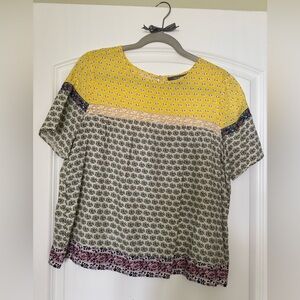 Anthropologie Blue Tassel brand print top w/ crochet detail, medium